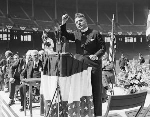 Father Charles E. Coughlin speaks at a political rally in Cleveland, Ohio, in May 1936. Source: Bettmann/Getty Images.